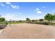 Outdoor volleyball court with sand surface and manicured landscaping around perimeter at 22884 E Via De Olivos --, Queen Creek, AZ 85142