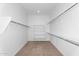 Walk-in closet with shelving and storage options at 22884 E Via De Olivos --, Queen Creek, AZ 85142