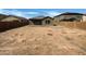 Large undeveloped backyard presenting a blank canvas to create your own outdoor retreat at 2367 E Rosario Mission Dr, Casa Grande, AZ 85194