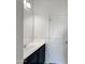 Modern bathroom with a sleek vanity and mirror, offering a clean and functional space at 2367 E Rosario Mission Dr, Casa Grande, AZ 85194
