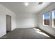 Bright, neutral bedroom featuring plush carpeting and ample natural light from the large windows at 2367 E Rosario Mission Dr, Casa Grande, AZ 85194