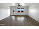 Spacious living room featuring stylish flooring, neutral walls, and ample natural light at 2367 E Rosario Mission Dr, Casa Grande, AZ 85194