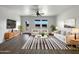 Bright living room with modern furniture, stylish rug, and plenty of natural light at 2367 E Rosario Mission Dr, Casa Grande, AZ 85194