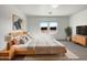 Inviting main bedroom with modern furnishings, a cozy rug, and great natural light at 2367 E Rosario Mission Dr, Casa Grande, AZ 85194