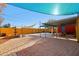 Expansive backyard with various seating areas, brickwork, a fountain and colorful exteriors at 2511 E Pinchot Ave, Phoenix, AZ 85016