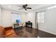 Clean bedroom features a desk and a piano, providing a versatile space for work and relaxation at 2511 E Pinchot Ave, Phoenix, AZ 85016