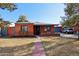 Charming brick home featuring a tidy front yard and a welcoming walkway leading to the front door at 2511 E Pinchot Ave, Phoenix, AZ 85016