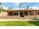 Picturesque backyard offering an inviting patio area and serene landscaping at 25238 S Mohawk Dr, Sun Lakes, AZ 85248