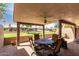 Inviting outdoor patio with comfortable seating and views of the surrounding landscape at 25238 S Mohawk Dr, Sun Lakes, AZ 85248