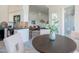 Open-concept dining area featuring modern decor and seamless flow into the living area at 255 S Kyrene Rd # 212, Chandler, AZ 85226