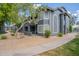 Inviting apartment featuring a charming patio and well-maintained landscape with walkway at 255 S Kyrene Rd # 212, Chandler, AZ 85226