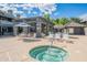 Community hot tub with lounge chairs and shade structure at 255 S Kyrene Rd # 212, Chandler, AZ 85226