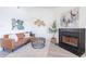Comfortable living room featuring a fireplace, stylish seating, and trendy decor at 255 S Kyrene Rd # 212, Chandler, AZ 85226