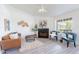 Cozy living room featuring a fireplace, and comfortable seating bathed in natural light at 255 S Kyrene Rd # 212, Chandler, AZ 85226