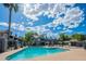 Community pool surrounded by lounge chairs and tables, ideal for recreation at 255 S Kyrene Rd # 212, Chandler, AZ 85226