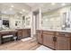 Luxurious bathroom with dual sinks, vanity, and walk-in shower with neutral finishes at 26999 W Ponderosa Ln, Buckeye, AZ 85396