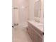 Bathroom featuring dual sinks and a shower-tub combo at 2896 E Maplewood St, Gilbert, AZ 85297