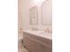 Bright bathroom showcasing dual sinks and a shower-tub at 2896 E Maplewood St, Gilbert, AZ 85297