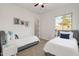 Cozy bedroom featuring two twin beds with nice window views at 2896 E Maplewood St, Gilbert, AZ 85297