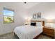 Cozy bedroom with a comfortable bed, natural light, and charming decor at 2896 E Maplewood St, Gilbert, AZ 85297