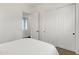 Bright bedroom with a large closet and white walls at 2896 E Maplewood St, Gilbert, AZ 85297