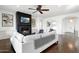 Cozy living room showcasing a fireplace, comfortable sofa, and modern design elements throughout at 2896 E Maplewood St, Gilbert, AZ 85297