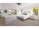 Serene main bedroom featuring neutral tones, backyard views, and a calming atmosphere at 2896 E Maplewood St, Gilbert, AZ 85297