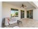 Comfortable covered patio area with plenty of light and sliding doors leading inside at 2896 E Maplewood St, Gilbert, AZ 85297
