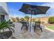Inviting backyard pool with patio, lounge chairs and beautiful landscaping for relaxing outdoors at 2896 E Maplewood St, Gilbert, AZ 85297