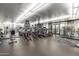 Large fitness center featuring treadmills, ellipticals, and weight machines with city views at 310 S 4Th St # 901, Phoenix, AZ 85004