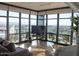 Bright living room with modern finishes, and floor-to-ceiling windows that offer panoramic city views at 310 S 4Th St # 901, Phoenix, AZ 85004