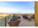 Inviting rooftop patio with comfortable seating, a cozy fire pit, and beautiful city views at 310 S 4Th St # 901, Phoenix, AZ 85004