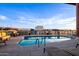 Rooftop pool with stunning views and comfortable lounge seating, perfect for relaxation at 310 S 4Th St # 901, Phoenix, AZ 85004