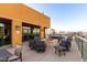 Spacious roof deck boasting a fire pit, lounge seating, and scenic city views at 310 S 4Th St # 901, Phoenix, AZ 85004
