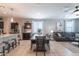 Open floor plan features a dining area adjacent to the living room and kitchen at 31045 W Mulberry Dr, Buckeye, AZ 85396