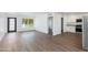 Open-concept living space showcasing modern finishes, light walls, and flowing access to the kitchen area at 3330 E Palm Ln, Phoenix, AZ 85008