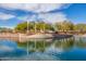 Amphitheater stage on the pond, perfect for community events at 37161 W Giallo Ln, Maricopa, AZ 85138