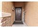 Close-up of the intricate metal front door with decorative accents at 37161 W Giallo Ln, Maricopa, AZ 85138