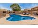 Beautiful private pool with steps and tiled waterfall feature and luxurious lounge chairs at 37161 W Giallo Ln, Maricopa, AZ 85138