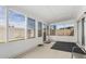 Bright sunroom featuring large windows and neutral tones at 4138 W Barbara Ave, Phoenix, AZ 85051