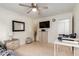 Neutral bedroom with ceiling fan and attached door to the Primary closet at 42491 W Chisholm Dr, Maricopa, AZ 85138