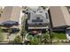 Aerial view of home featuring a solar panel system, backyard pool, patio, and desert landscaping at 43650 W Snow Dr, Maricopa, AZ 85138