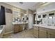 Bathroom featuring dual sinks, vanity area, and tile flooring at 43650 W Snow Dr, Maricopa, AZ 85138