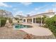 Gorgeous backyard pool area with lush landscaping, perfect for outdoor entertaining and relaxation in a private setting at 4522 S Wildflower Pl, Chandler, AZ 85248