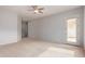 Spacious bedroom featuring plush carpeting and a ceiling fan at 4522 S Wildflower Pl, Chandler, AZ 85248