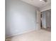Bedroom boasts neutral carpet and light walls, ideal for personalization, with easy access to adjacent rooms at 4522 S Wildflower Pl, Chandler, AZ 85248