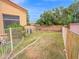 Fenced backyard with a well-defined lawn, a garden area, and ample space for outdoor enjoyment and relaxation at 4582 S Wildflower Pl, Chandler, AZ 85248
