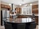Well-equipped kitchen with stainless steel appliances, granite countertops, and ample cabinet space at 4582 S Wildflower Pl, Chandler, AZ 85248