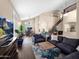 Spacious living room with staircase, hardwood floors, and lots of natural light at 4582 S Wildflower Pl, Chandler, AZ 85248