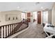 Upstairs loft area with staircase, view of other bedrooms, and built in workstation at 4582 S Wildflower Pl, Chandler, AZ 85248